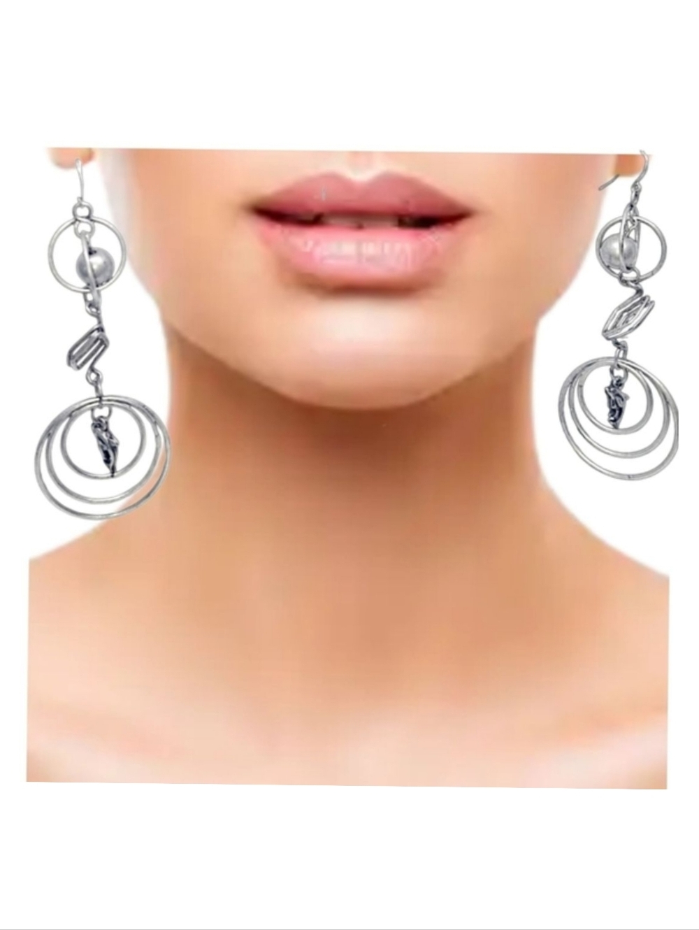 👣4/$20.   Dangling Silver Tone Earrings with Dolphins